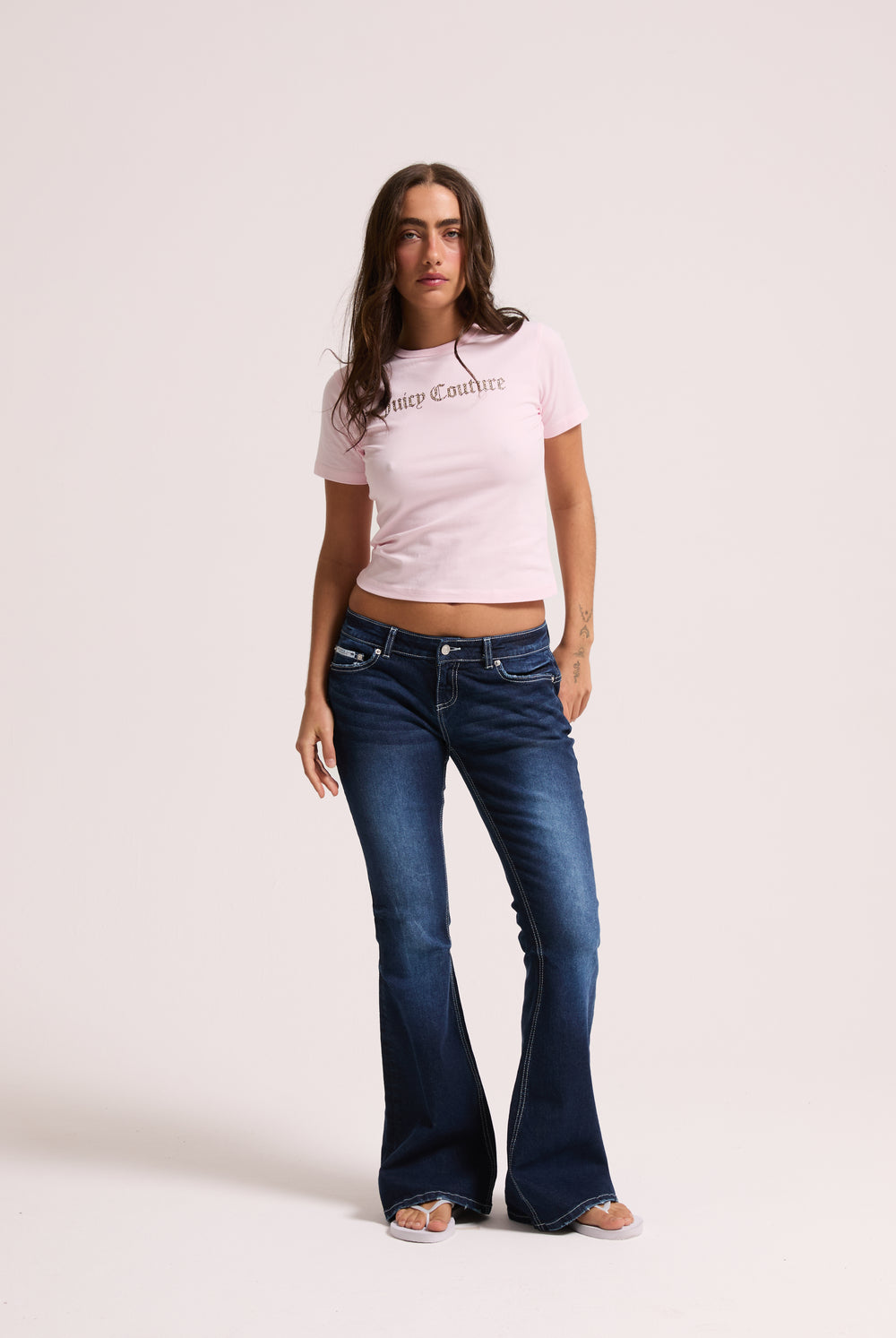 Displays a model wearing cherry blossom leopard 'Juicy' branded logo baby tee