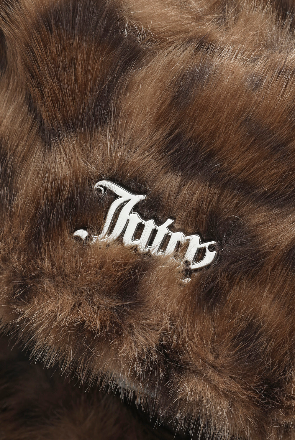 Displays the Natural Leopard 'Juicy' branded Long Pile Fur Trapper featuring the juicy branding
