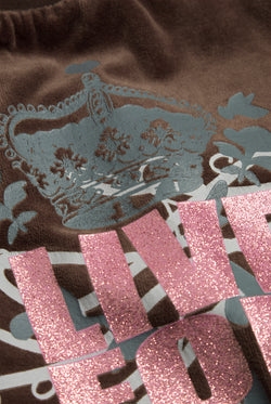 Displays the Java 'Juicy' branded Live For Juicy Og Straight Trackpants featuring the details on the juicy branding 
