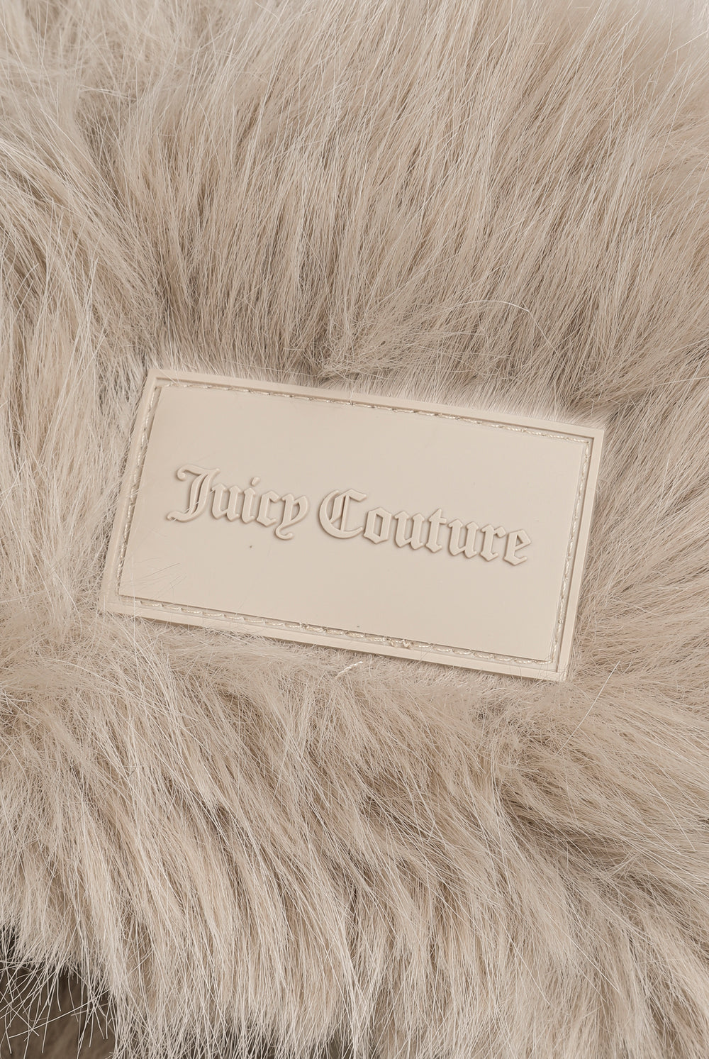 Displays the Natural 'Juicy' branded Long Pile Trapper Hat featuring the juicy couture branding 