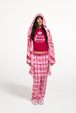 Displays a model wearing the Pink 'Juicy' branded Check Plush Robe