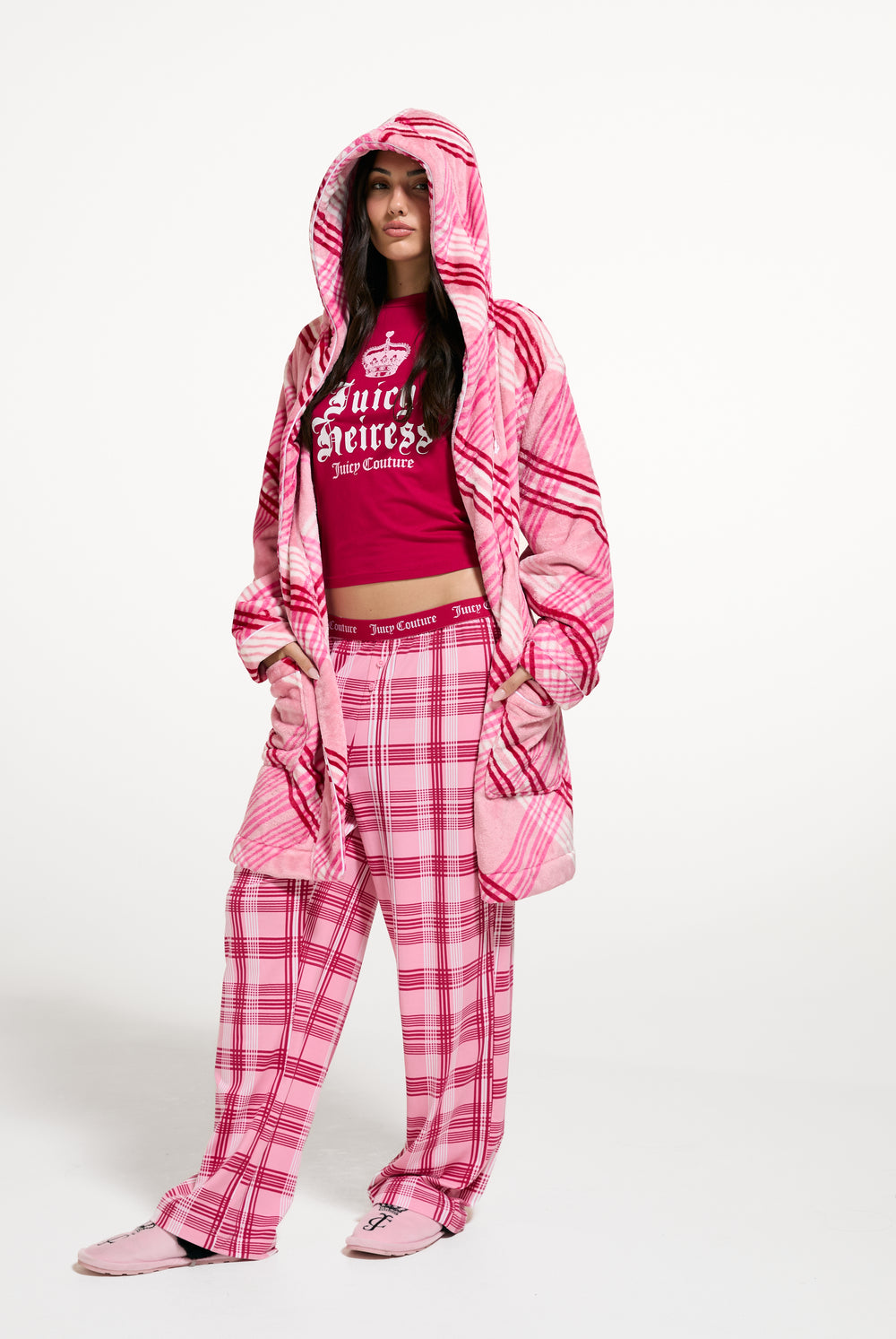 Displays a model wearing the Pink 'Juicy' branded Check Plush Robe