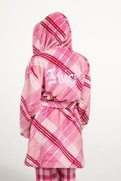 Displays a model wearing the Pink 'Juicy' branded Check Plush Robe