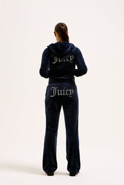 Displays a model wearing the Night Sky Diamanté 'Juicy' branded velour zip-through hoodie  