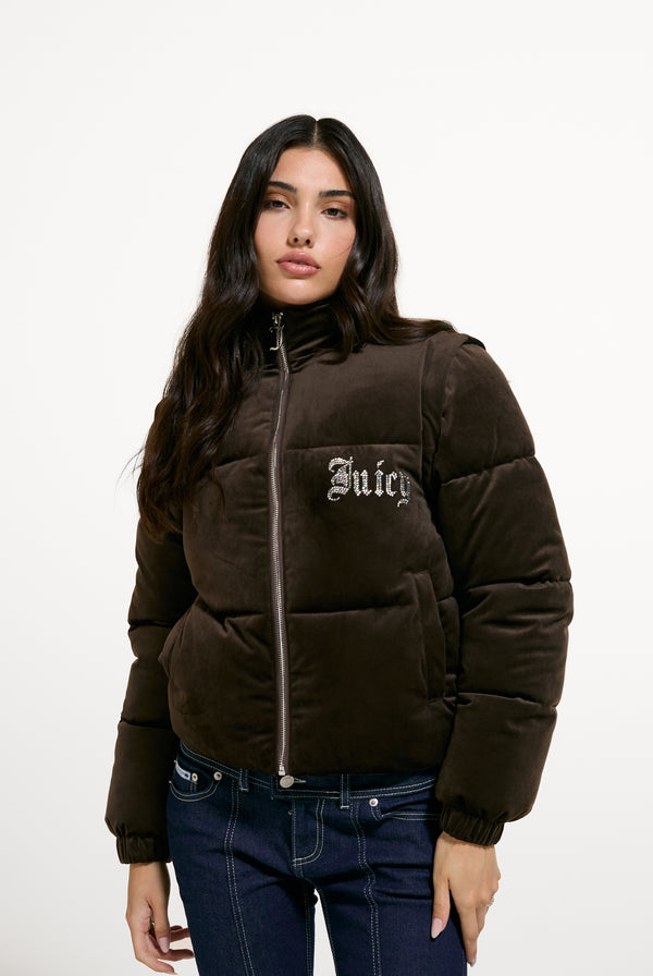 Displays a model wearing the Java 'Juicy' branded Old Gothic Diamanté Puffa Jacket
