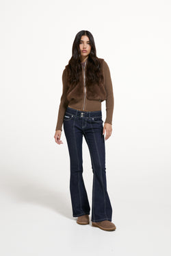 Displays a model wearing the Java 'Juicy' branded Faux Fur Knitted Jacket
