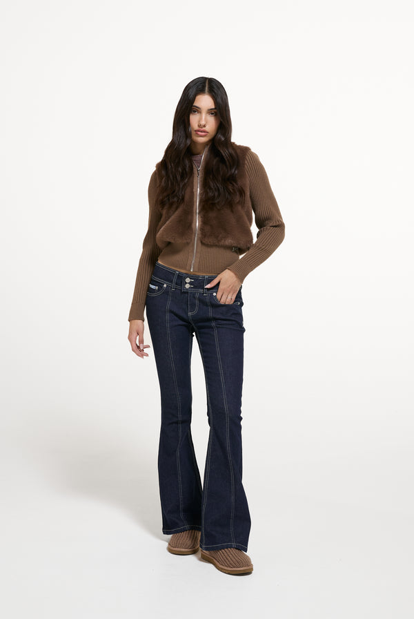 Displays a model wearing the Java 'Juicy' branded Faux Fur Knitted Jacket