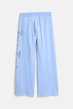 Displays the Powder Blue 'Juicy' branded Old Gothic Diamante Og Straight Leg Trackpant