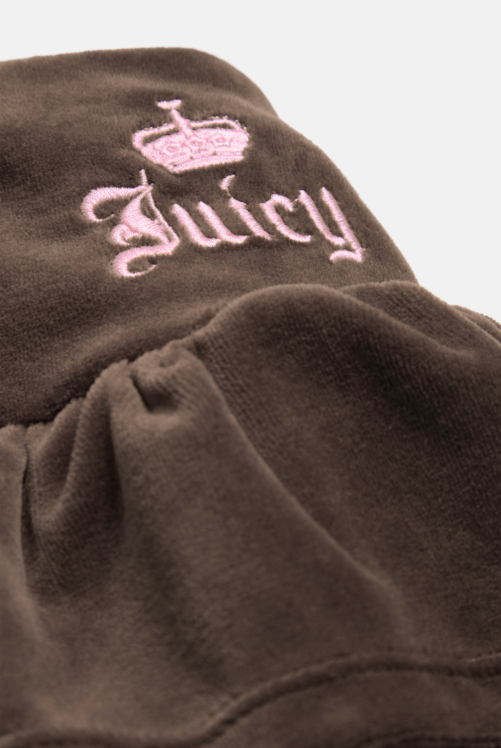Displays the Java 'juicy' branded Cotton Velour Ruffle Skirt featuring the juicy couture branding 