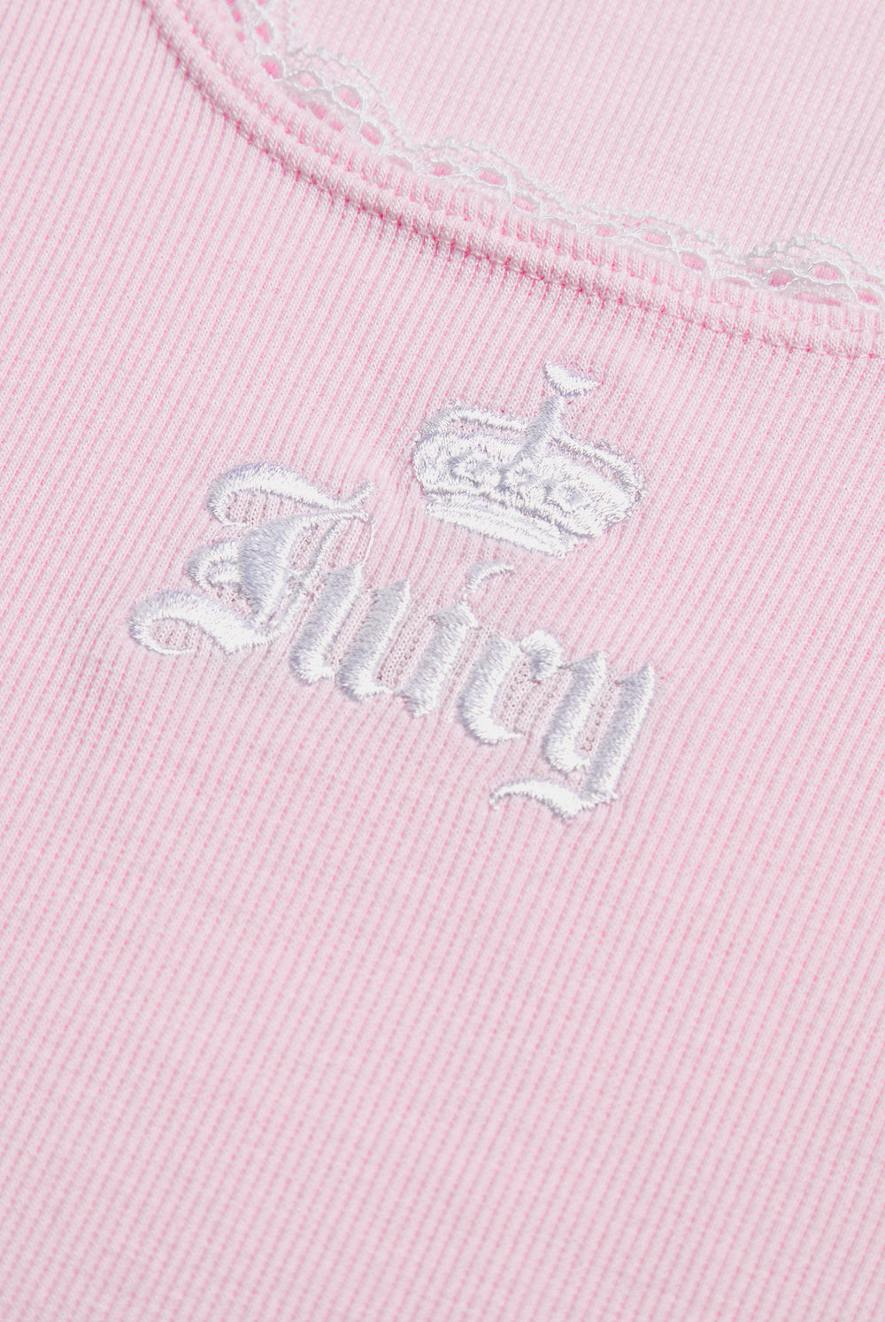 Displays the Cherry Blossom 'Juicy' branded Lace Trim Vest featuring the details on the juicy branding 