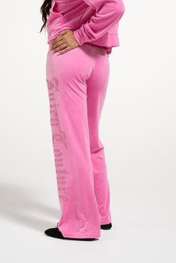 Displays a model wearing the Wild Orchid 'Juicy' branded Old Gothic Diamante OG Straight Leg Trackpant