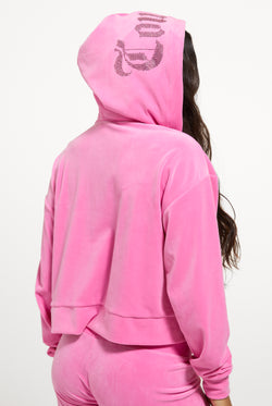 Displays a model wearing the Wild Orchid 'Juicy' branded Old Gothic Oversized Cropped Hoodie