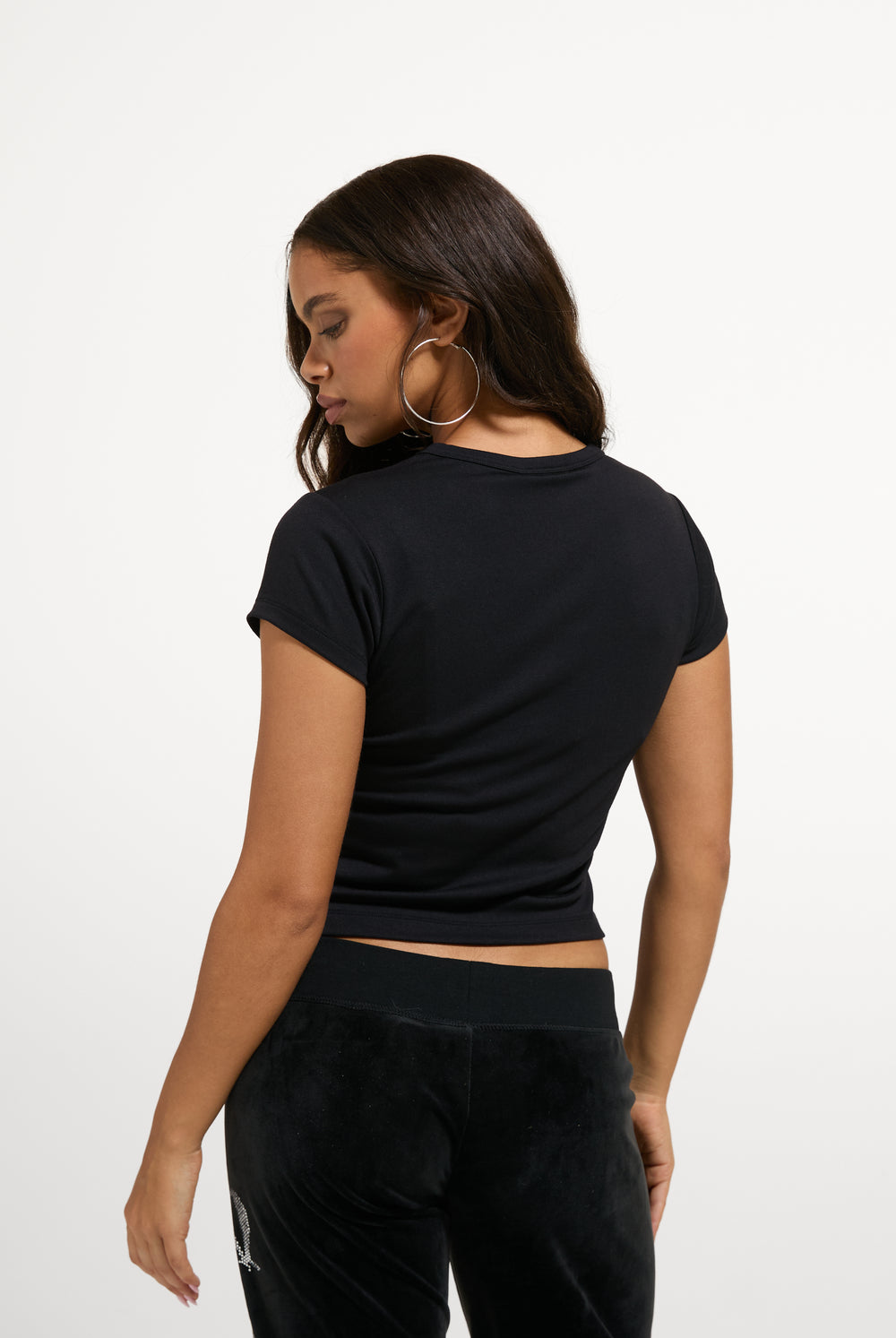 Displays a model wearing the Black 'Juicy' branded  Old Gothic Baby T-Shirt