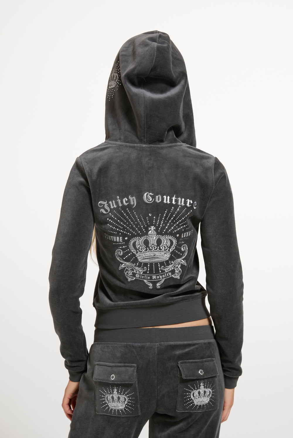 Displays a model wearing the Raven 'Juicy' branded Regal Rebelle Robyn Hoodie