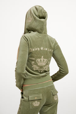 Displays a model wearing the Oil Green 'Juicy' branded Regal Rebelle Robyn Hoodie