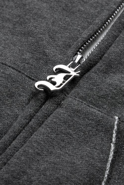 Displays the Charcoal Marl 'Juicy' branded Longline Fleece Zip-Through Hoodie featuring the details on the juicy branded zip