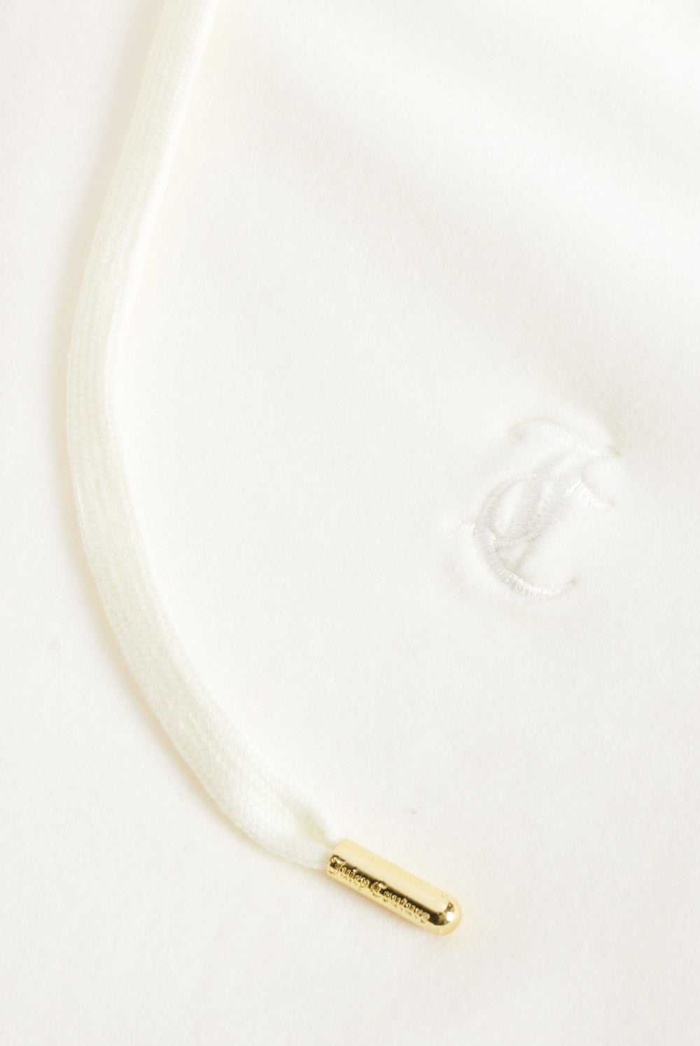 Displays the Cream & Gold 'Juicy' branded velour Robertson hoodie featuring the juicy couture logo