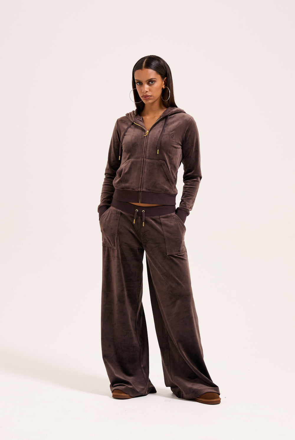 Displays the model wearing the Java & Gold 'Juicy' branded classic velour Robertson hoodie 