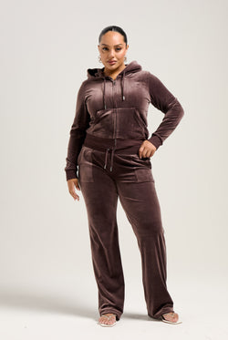 Displays a model wearing the Java 'Juicy' branded classic velour Robertson hoodie 