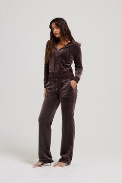 Displays a model wearing the Java 'Juicy' branded classic velour Robertson hoodie 