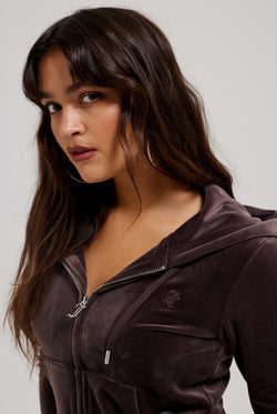 Displays a model wearing the Java 'Juicy' branded classic velour Robertson hoodie 