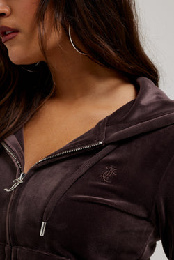 Displays a model wearing the Java 'Juicy' branded classic velour Robertson hoodie 