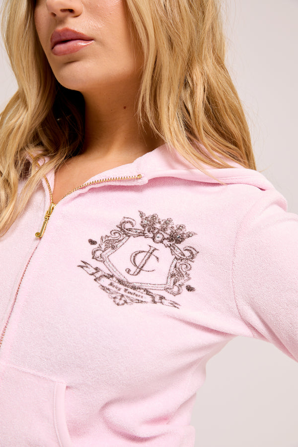 Displays a model wearing the Cherry Blossom Towelling 'Juicy' branded chateau hoodie 