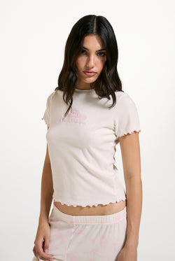 Displays a model wearing the Marshmallow 'Juicy' branded Rose Rib Pyjama Set