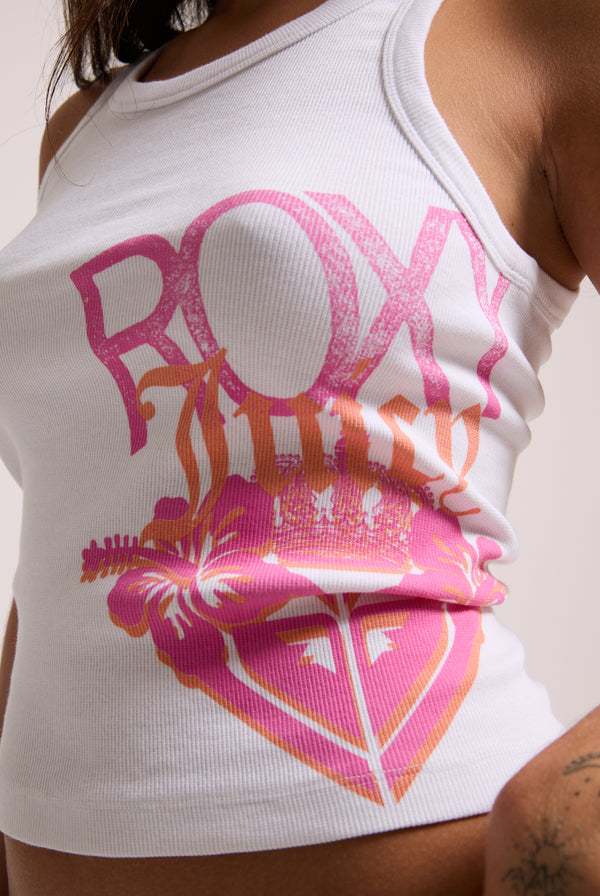 Displays a model wearing the White Roxy & Juicy couture tank top featuring the Roxy x Juicy logo