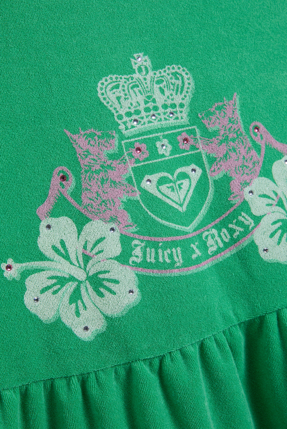 Displays the Island Green Juicy Couture & Roxy Terry towelling peplum dress featuring juicy x Roxy logo