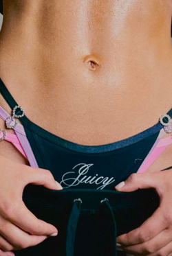 Displays a model wearing a microfibre script print thong