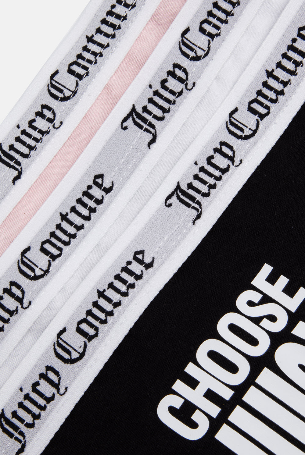 Displays all 3 of the white black & pink 'Juicy' branded Slogan Novelty Thongs included in the Pack Of 3 featuring the details on the juicy branding 