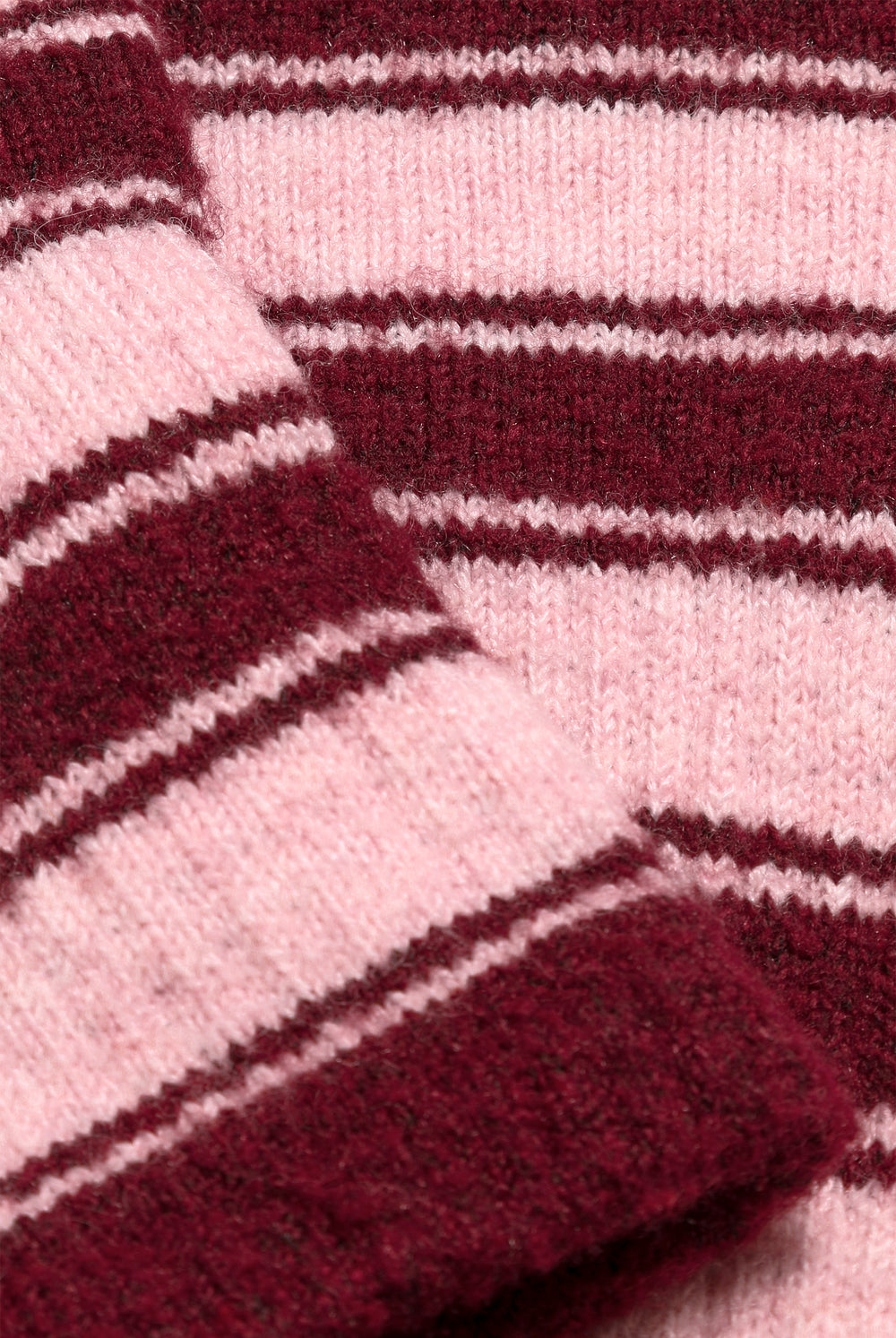 Displays the Burgundy Stripe 'Juicy' branded Fingerless Mittens featuring close up on the details 