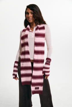 Displays a model wearing the Burgundy 'juicy' branded Stripe Knit Scarf