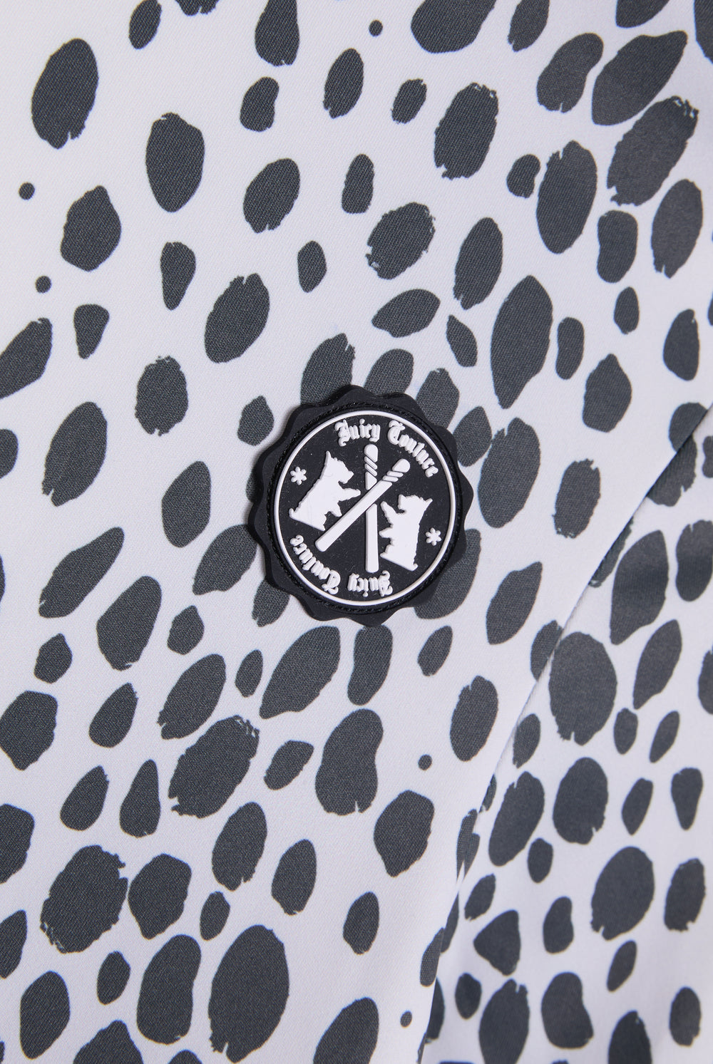 Displays the Ski Snow Leopard print 'Juicy' branded long sleeve top featuring the logo
