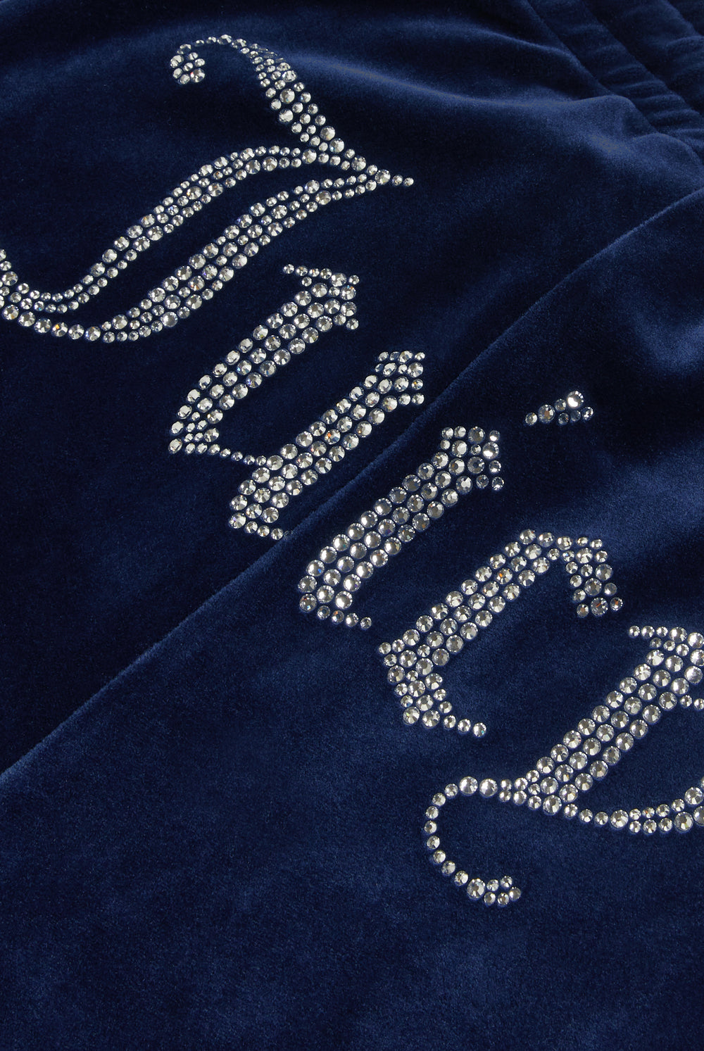Displays the Night Sky 'juicy' branded velour diamanté tracksuit bottom featuring the Juicy branding 