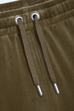 Displays the Dark Olive 'Juicy' branded velour diamanté tracksuit bottom