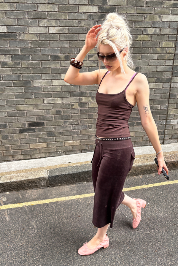 Displays a model wearing the Java 'Juicy' branded OG straight pocketed capri pants