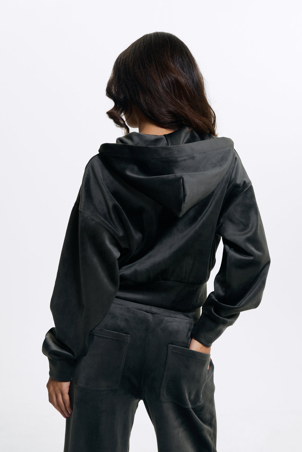 Displays a model wearing the Raven 'Juicy' branded Velour Bonded Hoodie