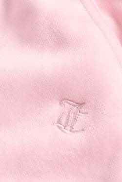 Displays the Cherry Blossom 'Juicy' branded Velour Bonded Tracksuit Bottom featuring the juicy branding 