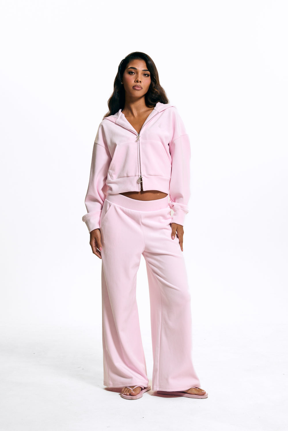 Displays a model wearing the Cherry Blossom 'Juicy' branded Velour Bonded Tracksuit Bottom