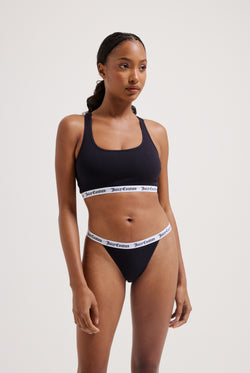 Displays a model wearing the black 'Juicy' branded cotton waistband briefs 