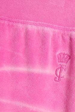 Displays the Super Pink washed 'Juicy' branded OG straight track pant featuring the juicy Couture logo