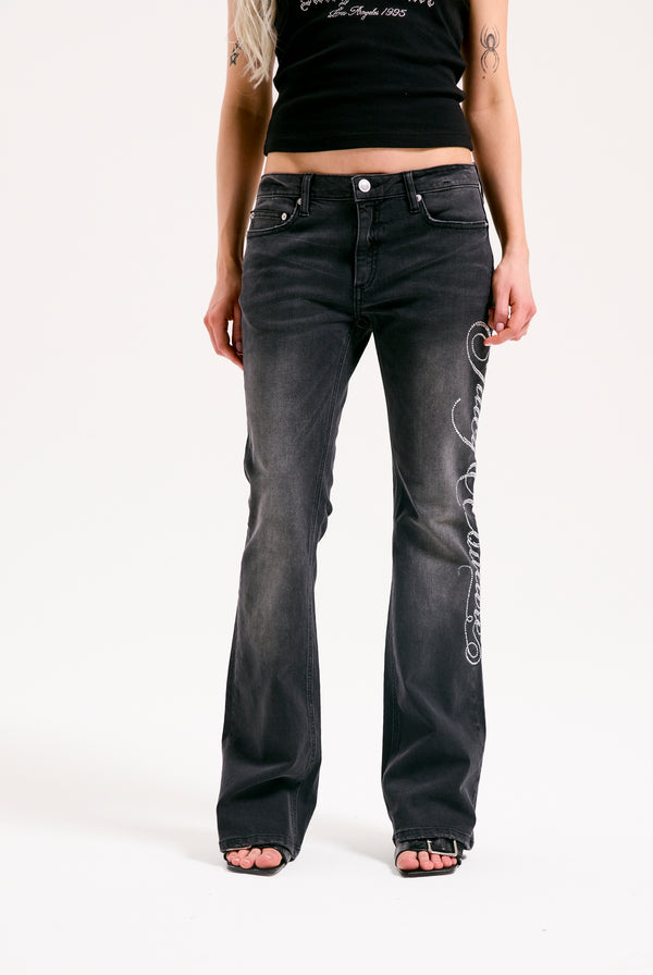 WASHED BLACK WESTERN SCRIPT DIAMANTE FLARED JEANS