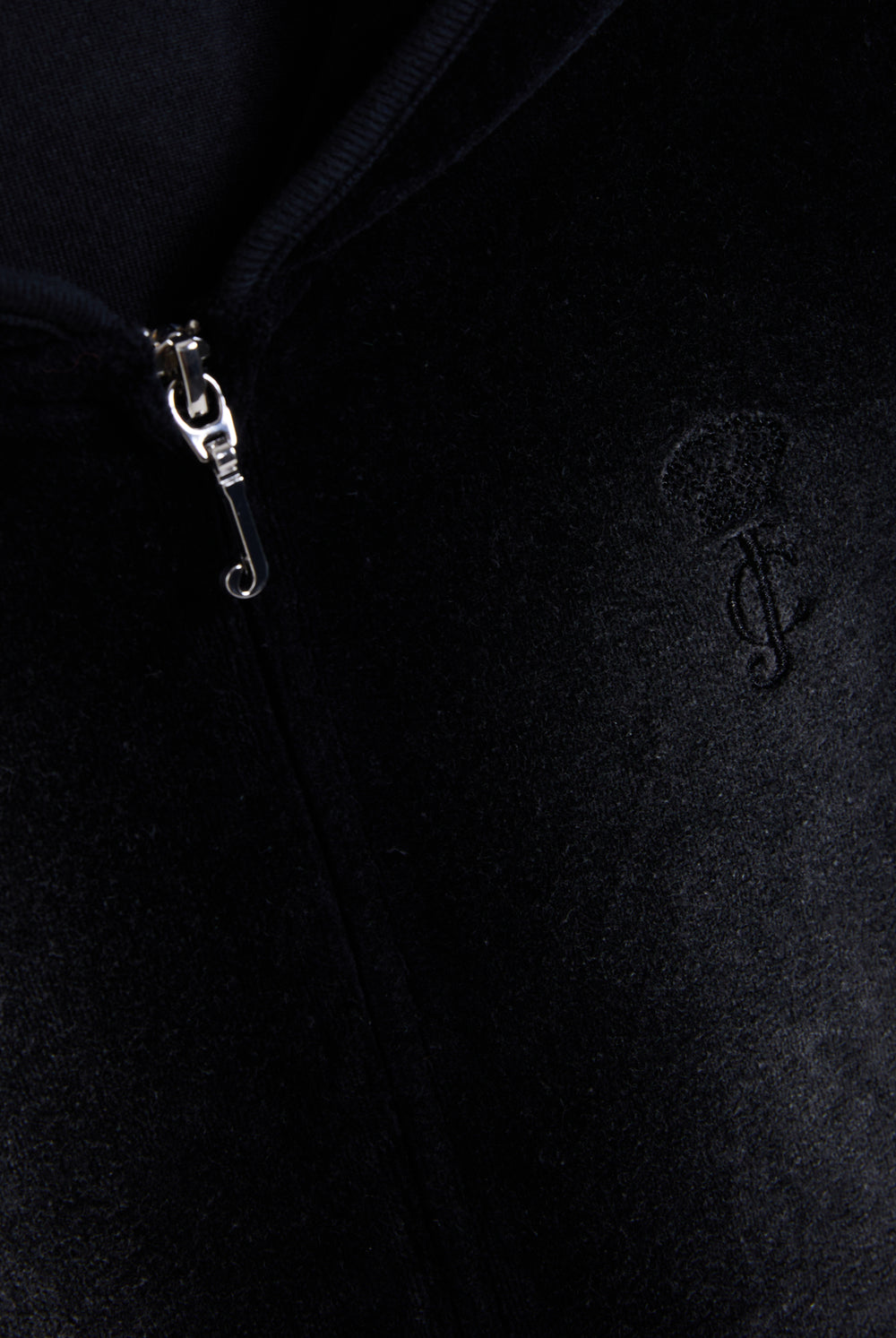 Displays the washed black cotton 'Juicy' branded velour heritage hoodie featuring the juicy logo and zip 
