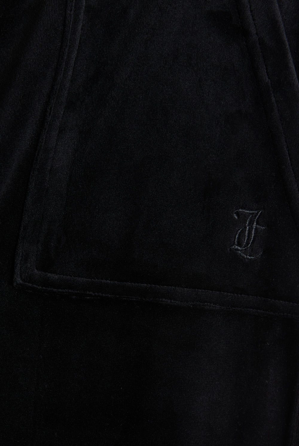 Display the Black 'Juicy' branded wide leg classic velour track pant featuring the juicy couture logo
