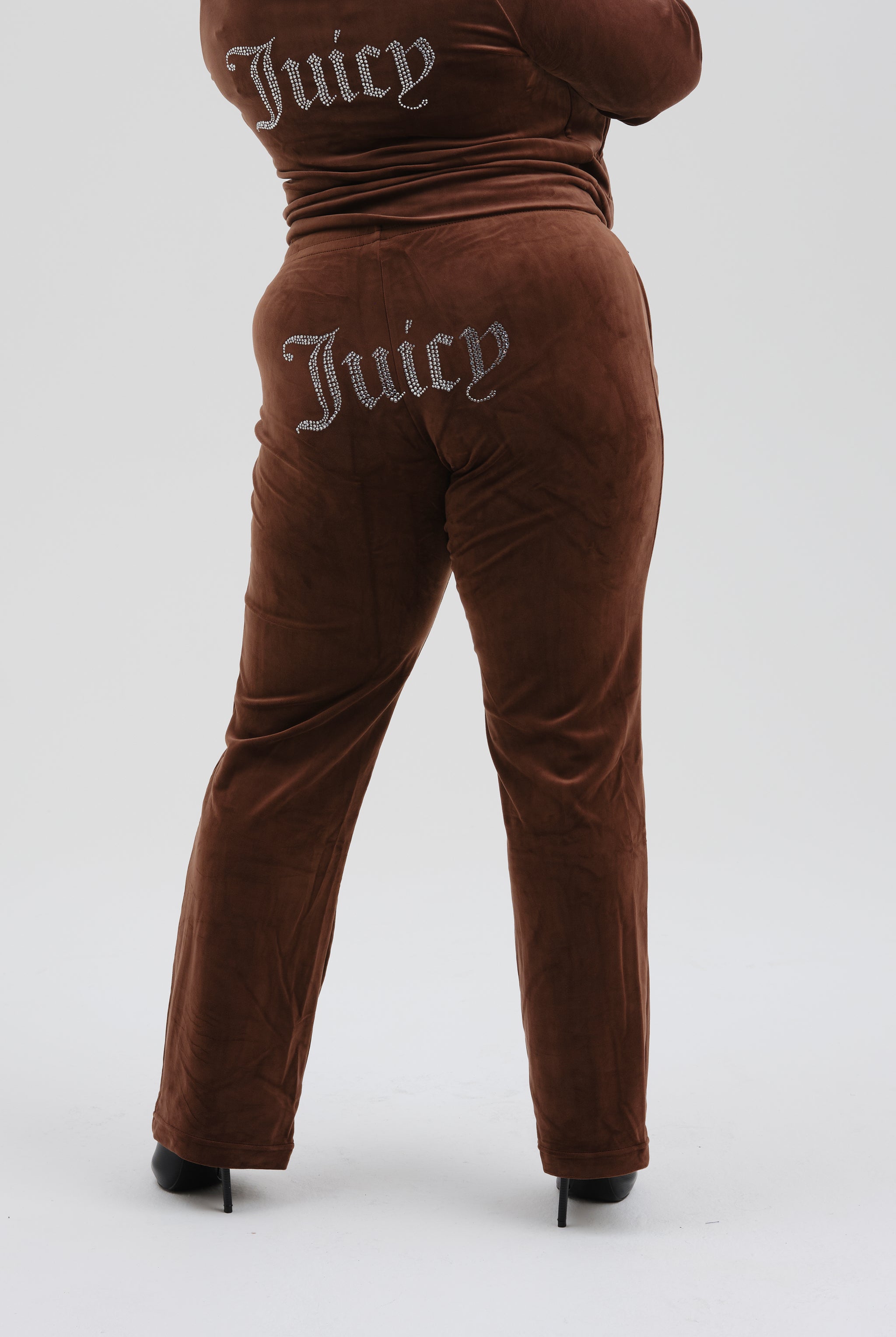 Juicy couture velour tracksuit cheap with juicy on the bum