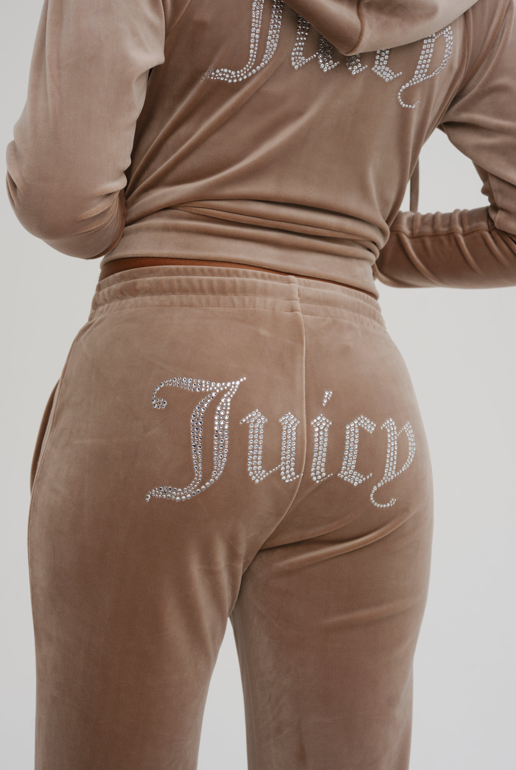 Juicy couture bottoms with cheap juicy on the bum